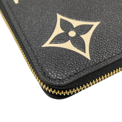 Louis Vuitton Long Wallet Bicolor Monogram Empreinte Tongue Zippy Wallet M80481