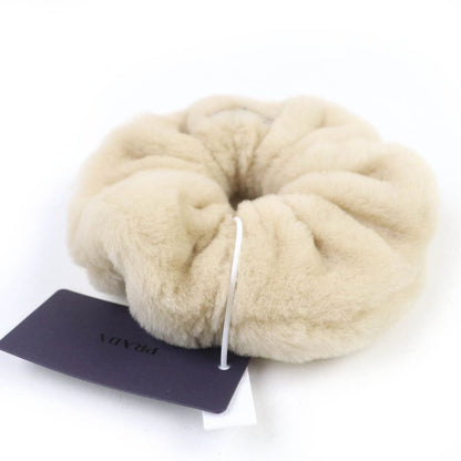 Prada 1if131 Triangle Logo Triangle Plate Mouton Fur Chou Hair Accessory Beige