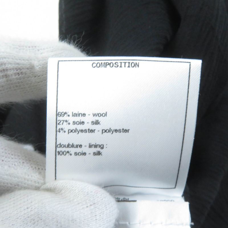 CHANEL 22A P73158 Wool Silk Blend Asymmetrical Skirt With Coco Mark Plate Black