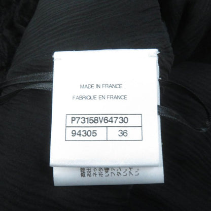 CHANEL 22A P73158 Wool Silk Blend Asymmetrical Skirt With Coco Mark Plate Black