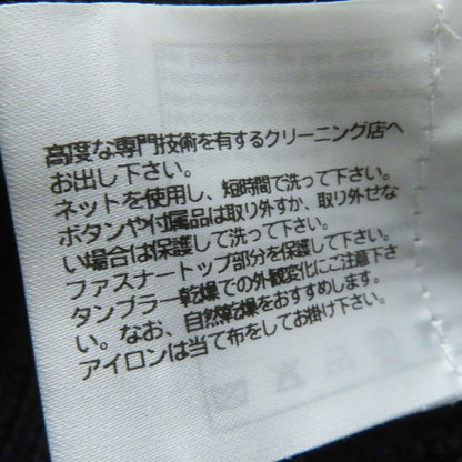 CHANEL 22S P72760 Cropped Short-sleeved Knit With Rhinestone Coco Mark Buttons