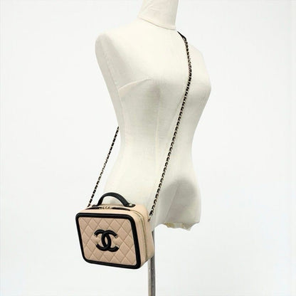 Chanel Bag Shoulder Caviar Leather Beige Black Gold CC Filigree