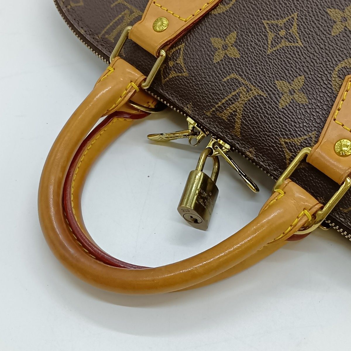 Louis Vuitton Monogram Alma Handbag M51130 Brown Padlock Key Miss Ing
