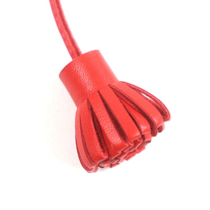 Hermes Carmencita Leather Silver Hardware Pompon Bookmark Bagcharm Orange With