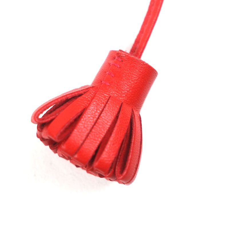 Hermes Carmencita Leather Silver Hardware Pompon Bookmark Bagcharm Orange With