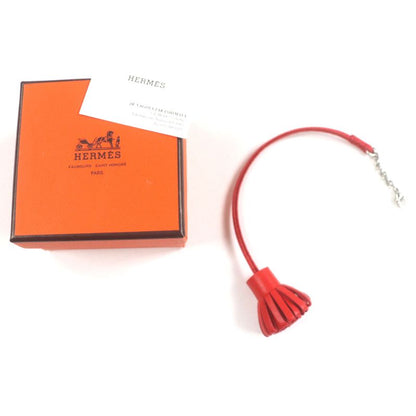 Hermes Carmencita Leather Silver Hardware Pompon Bookmark Bagcharm Orange With
