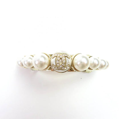 CHANEL I22S Faux Pearl Hair Accessory Barrette With Coco Mark Stone Gold