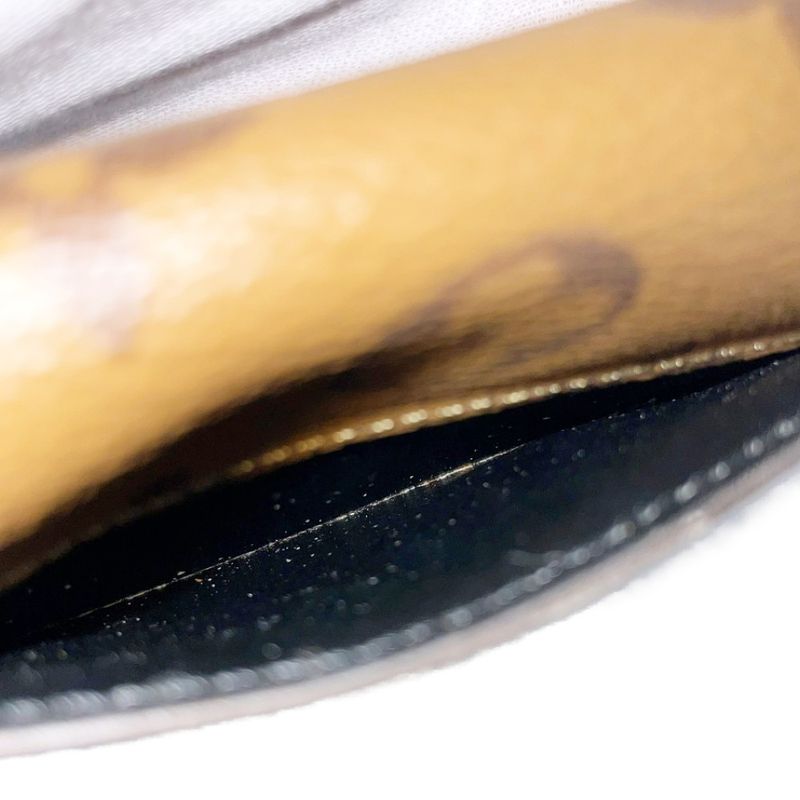 Louis Vuitton M82333 Monogram Reverse PVC Porte Monerosali Coin Case Brown
