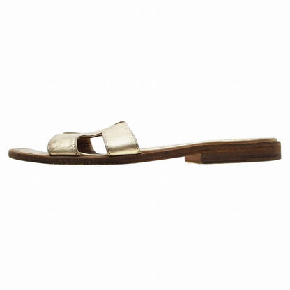 Hermes Oran Sandals Mules Gold Leather Flat Slides Made in Italy Size 34.5