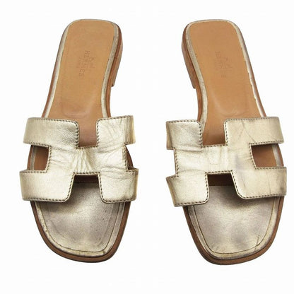 Hermes Oran Sandals Mules Gold Leather Flat Slides Made in Italy Size 34.5
