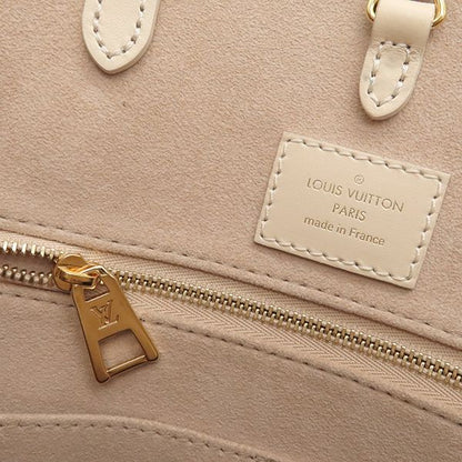 Louis Vuitton Tote Bag on the Go MM Monogram Empreinte Bicolor Monogram