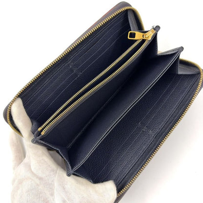 Louis Vuitton Zippy Wallet Monogram Empreinte Monogram Empreinte Marine Rouge