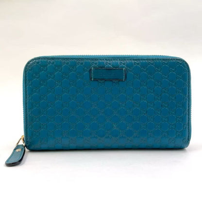 Gucci Micro Guccissima Zip Around Leather Turquoise Blue Wallet Silver