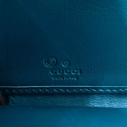 Gucci Micro Guccissima Zip Around Leather Turquoise Blue Wallet Silver