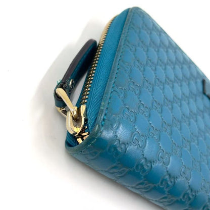 Gucci Micro Guccissima Zip Around Leather Turquoise Blue Wallet Silver