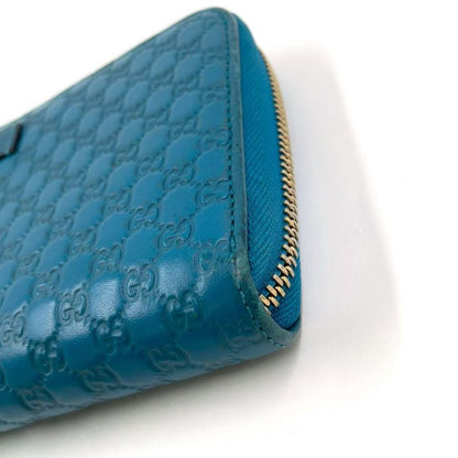 Gucci Micro Guccissima Zip Around Leather Turquoise Blue Wallet Silver
