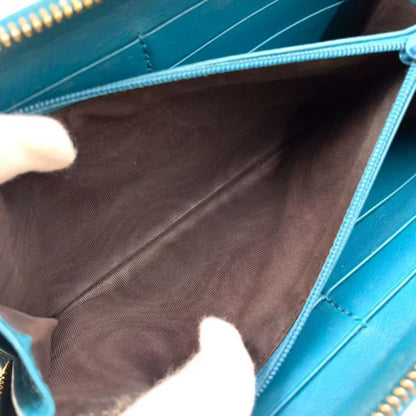 Gucci Micro Guccissima Zip Around Leather Turquoise Blue Wallet Silver