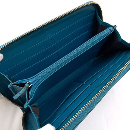 Gucci Micro Guccissima Zip Around Leather Turquoise Blue Wallet Silver