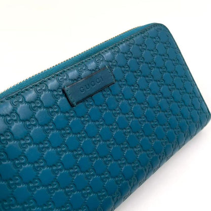 Gucci Micro Guccissima Zip Around Leather Turquoise Blue Wallet Silver