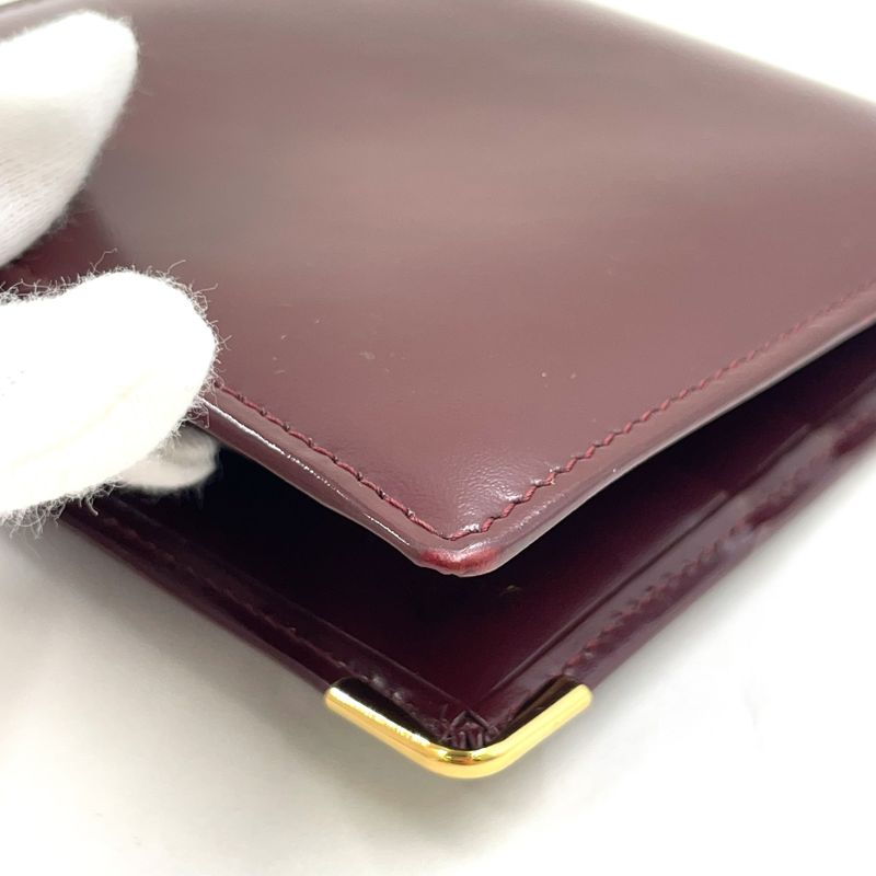 Cartier Must Line Bifold Leather Bordeaux Wallet Gold