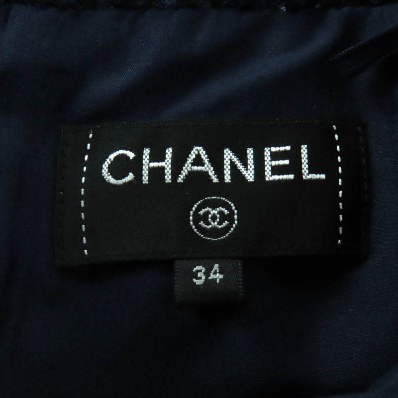 CHANEL P60275 Lined With 100% Silk Lapausa Trapezoidal Tweed Skirt With Coco