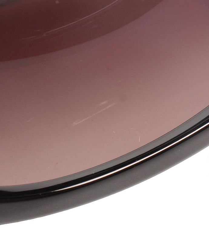 Cartier Sunglasses In Acetate In 18k Yellow Gold On A White Background