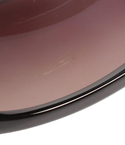 Cartier Sunglasses In Acetate In 18k Yellow Gold On A White Background