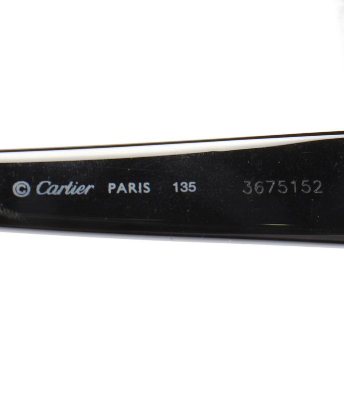 Cartier Sunglasses In Acetate In 18k Yellow Gold On A White Background