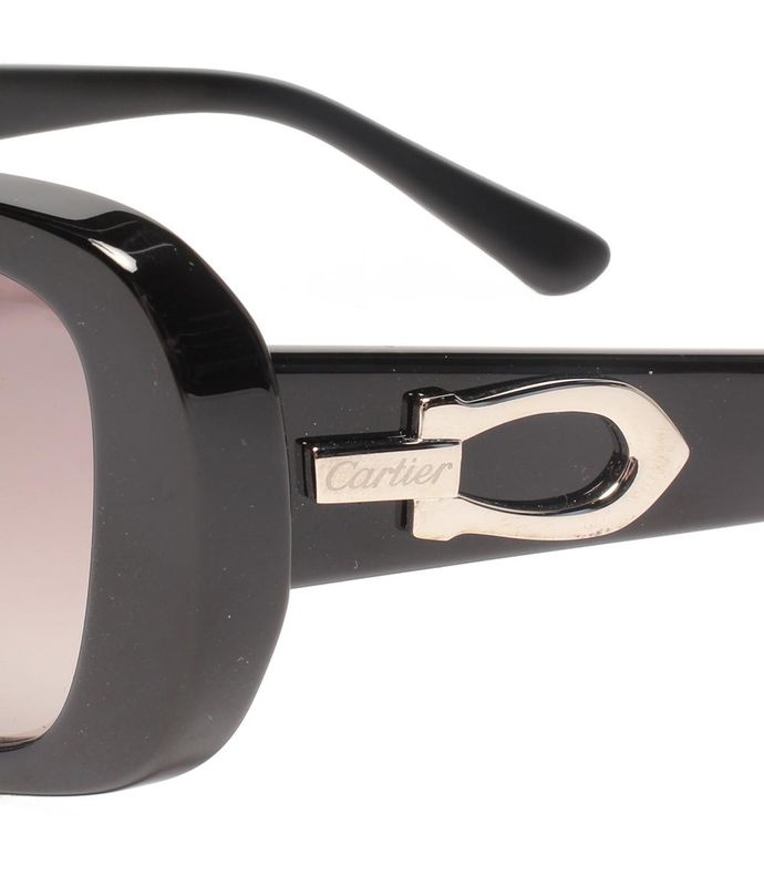 Cartier Sunglasses In Acetate In 18k Yellow Gold On A White Background