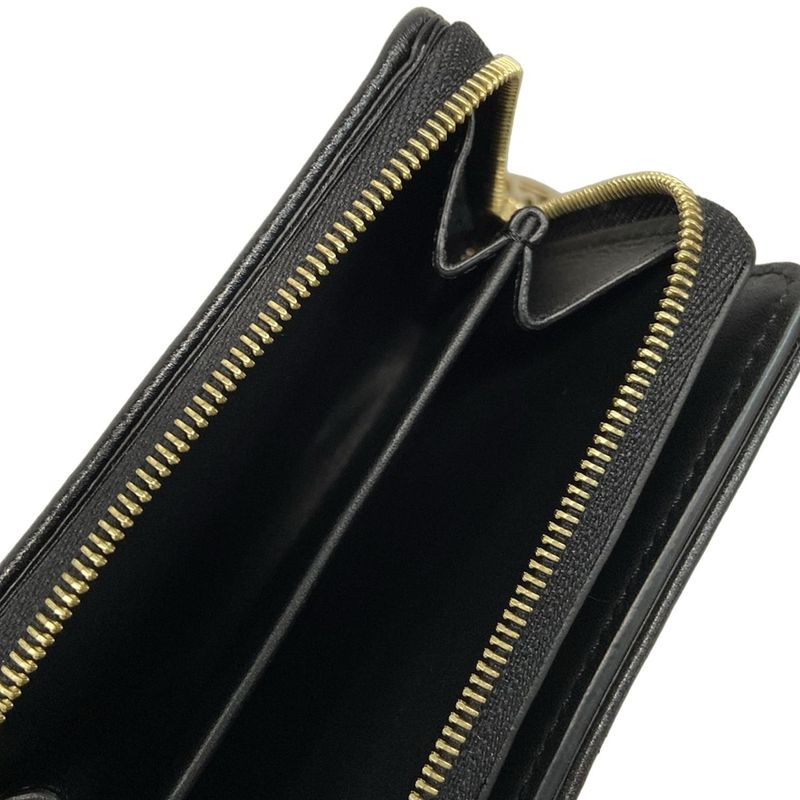 Louis Vuitton Coussin Portefeuille Lou M81599 Noir Black Leather