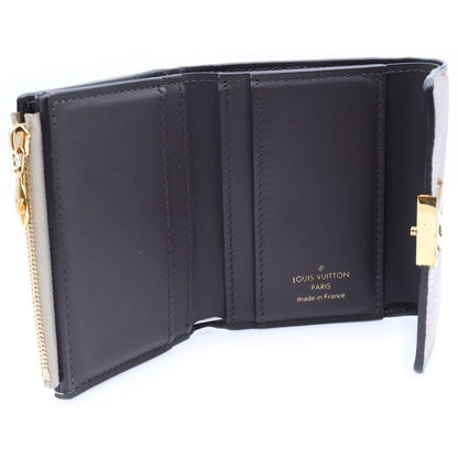 Louis Vuitton Portefeuille Capucines XS Trifold Compact Wallet Coin Case Beige