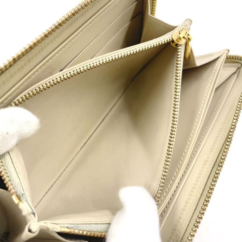 Louis Vuitton Zippy Round Zipper Enamel Leather Yellow Wallet Gold M90142