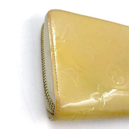Louis Vuitton Zippy Round Zipper Enamel Leather Yellow Wallet Gold M90142