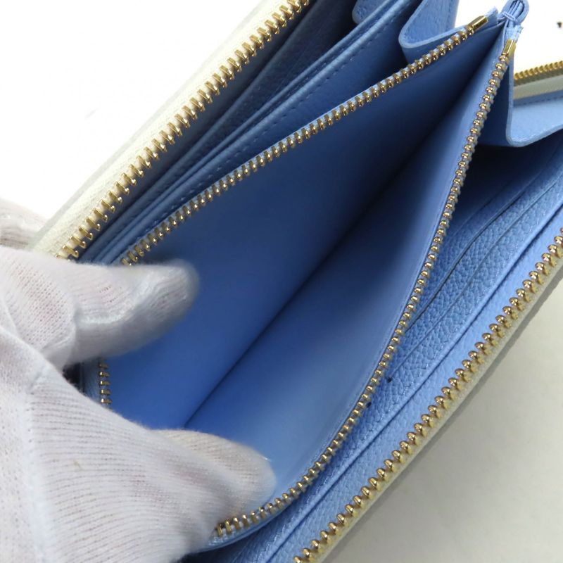 Louis Vuitton M83308 Monogram Empreinte Latte White Candy Blue Zippy Wallet