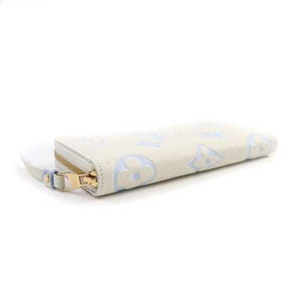 Louis Vuitton M83308 Monogram Empreinte Latte White Candy Blue Zippy Wallet