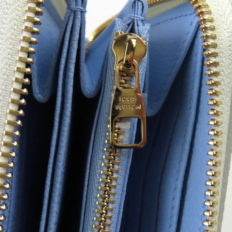 Louis Vuitton M83308 Monogram Empreinte Latte White Candy Blue Zippy Wallet