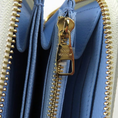 Louis Vuitton M83308 Monogram Empreinte Latte White Candy Blue Zippy Wallet