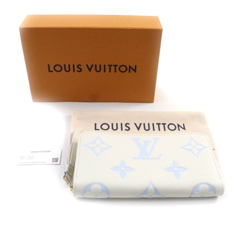 Louis Vuitton M83308 Monogram Empreinte Latte White Candy Blue Zippy Wallet
