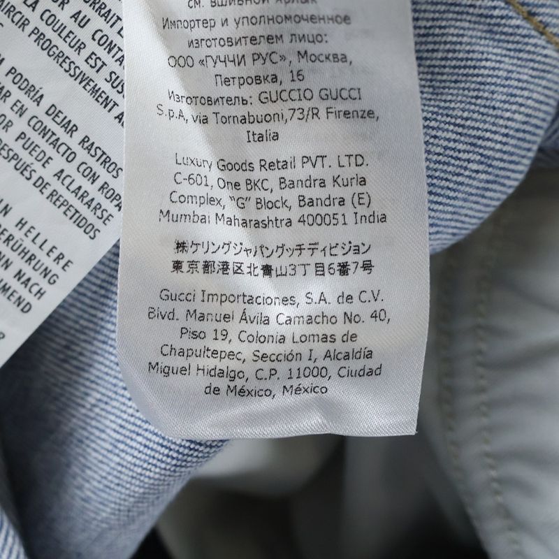 Gucci Vintage Logo Print Leather Patch Washed Button Fly Tapered Denim Pants