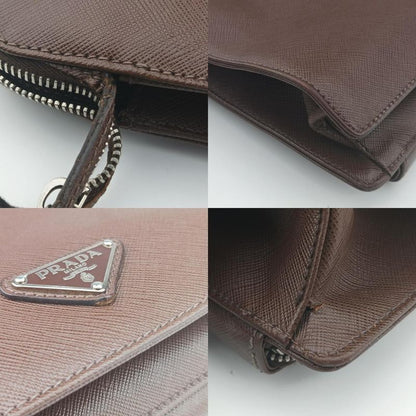 Prada Triangle Logo Plate Brown Saffiano Leather 49