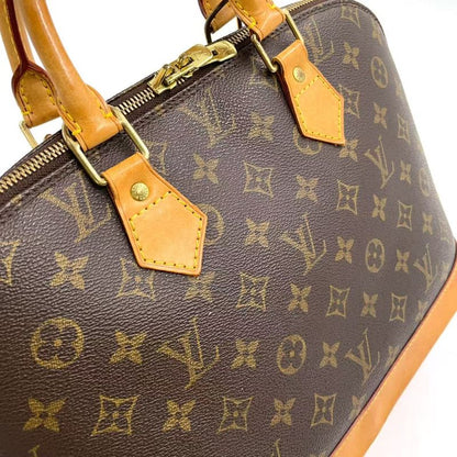 Louis Vuitton Alma PM Monogram Leather × PVC Brown Handbag Gold M51130