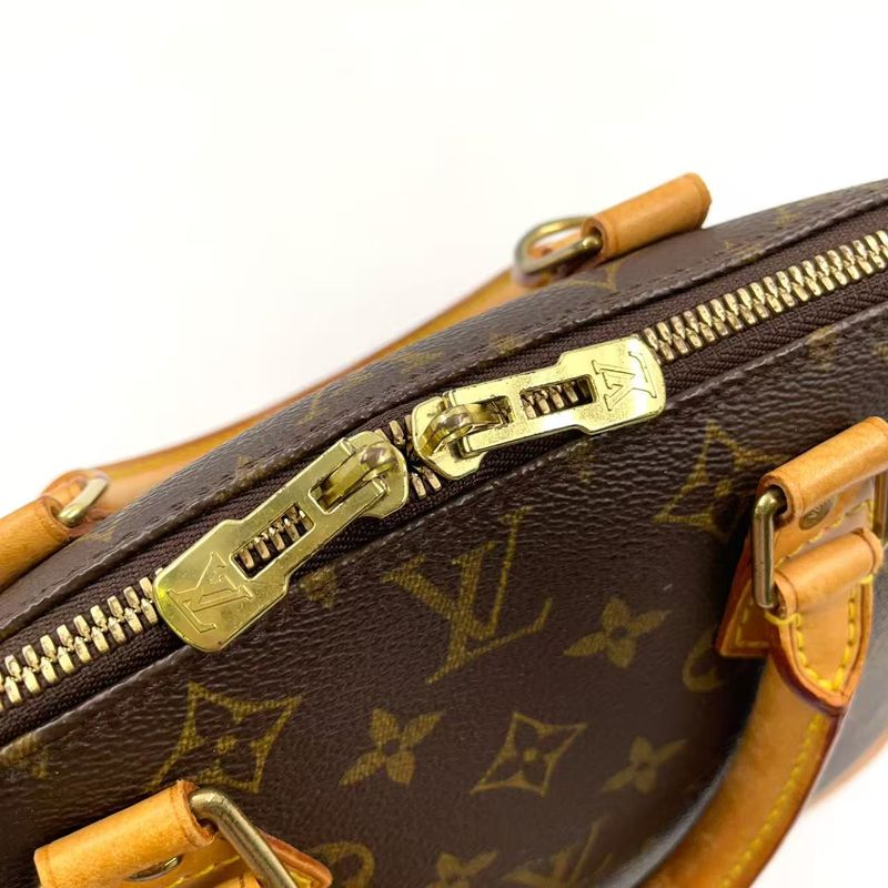 Louis Vuitton Alma PM Monogram Leather × PVC Brown Handbag Gold M51130