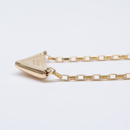 Prada 1jca37 750 Eternal Gold With Small Triangle Pendant
