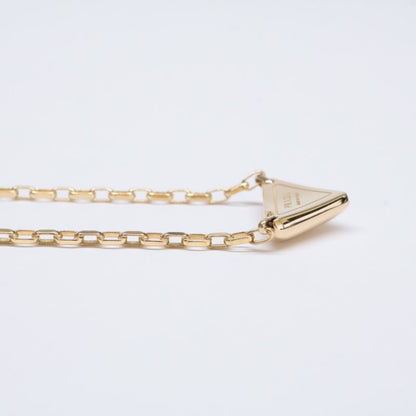 Prada 1jca37 750 Eternal Gold With Small Triangle Pendant