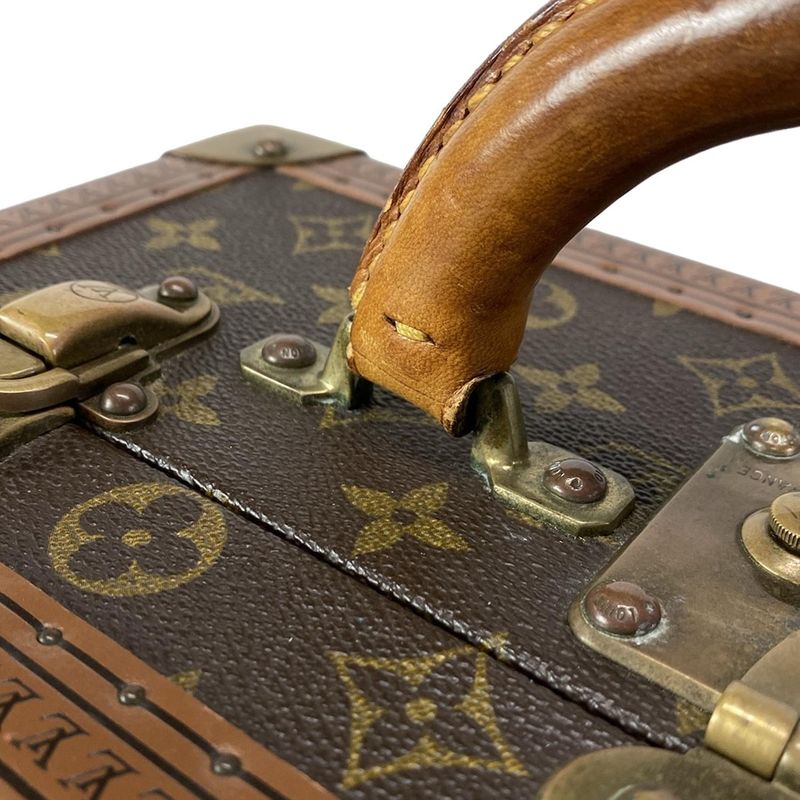 Louis Vuitton Trunk Case Monogram Tabor M47112