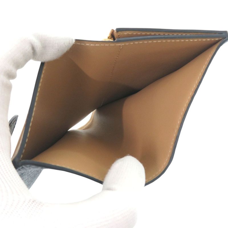 Louis Vuitton Capucines Compact Vertical M81561 Taurillon Leather Black Bifold