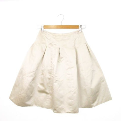 Chanel Flared Skirt Knee Length Silk Box Pleats Shiny Logo Plate 36 S Beige
