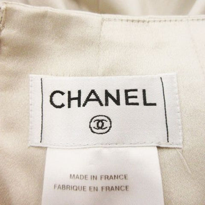 Chanel Flared Skirt Knee Length Silk Box Pleats Shiny Logo Plate 36 S Beige