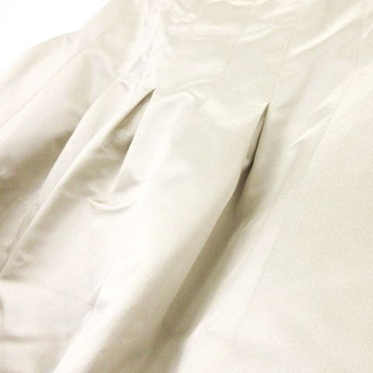 Chanel Flared Skirt Knee Length Silk Box Pleats Shiny Logo Plate 36 S Beige