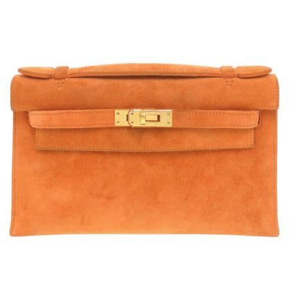 Hermes Pochette Kelly Dobris Orange I Engraved Gold Hardware Clutch Bag